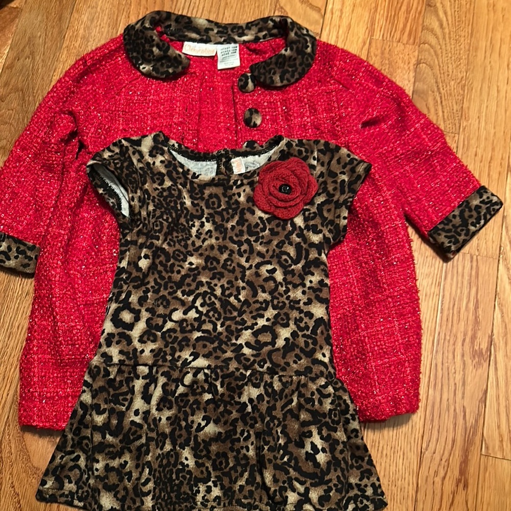 Leopard print dress with red jacket over